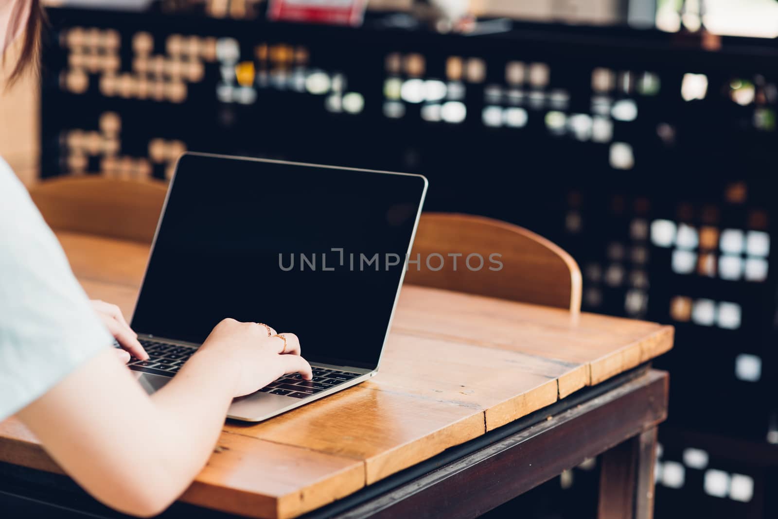 Business young female lifestyle freelance working using on lapto by Sorapop