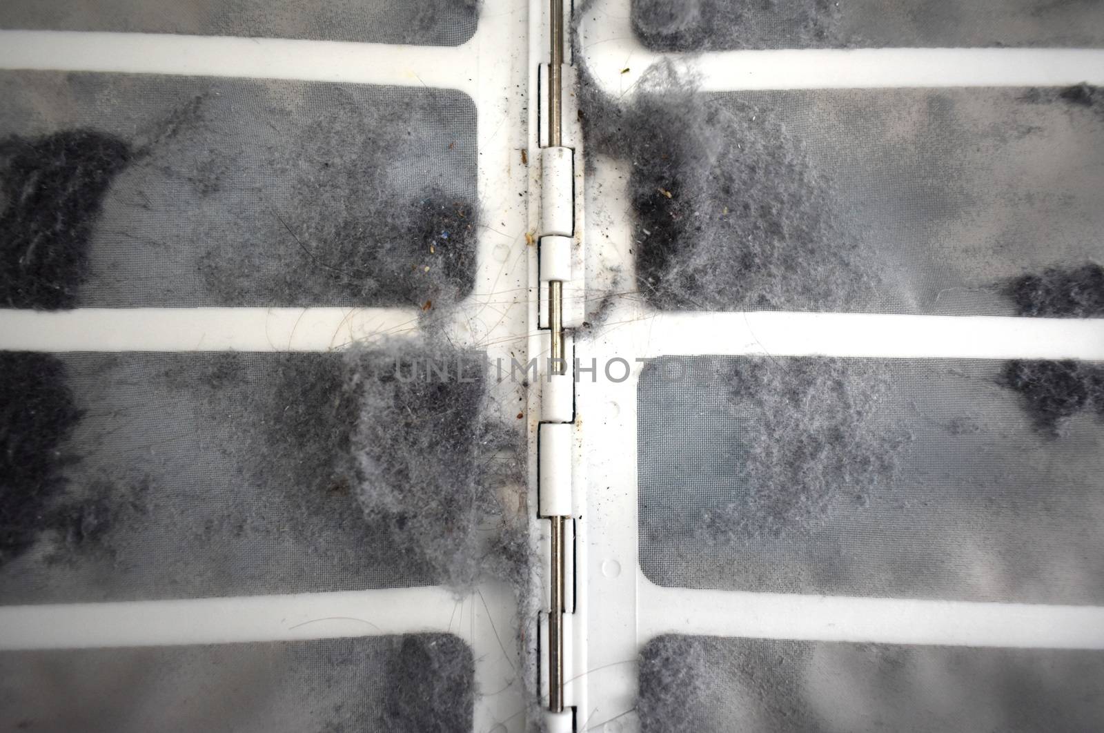 A small amount of lint in a dryer filter