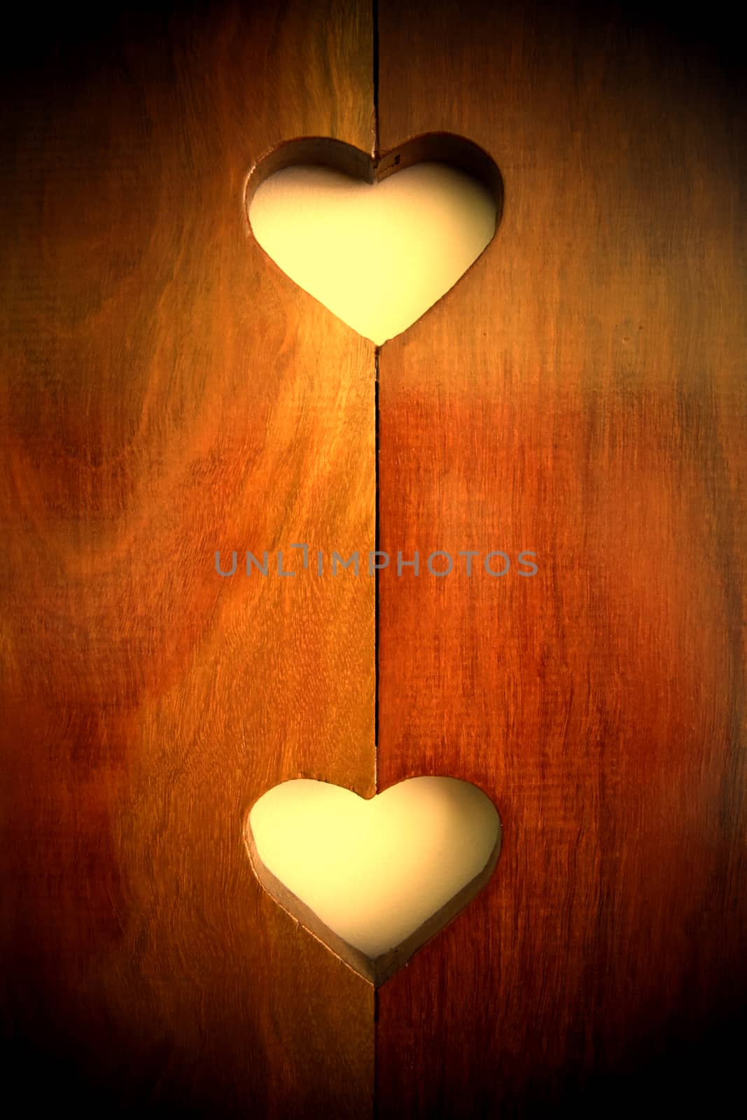 Heart shape carved in wood.