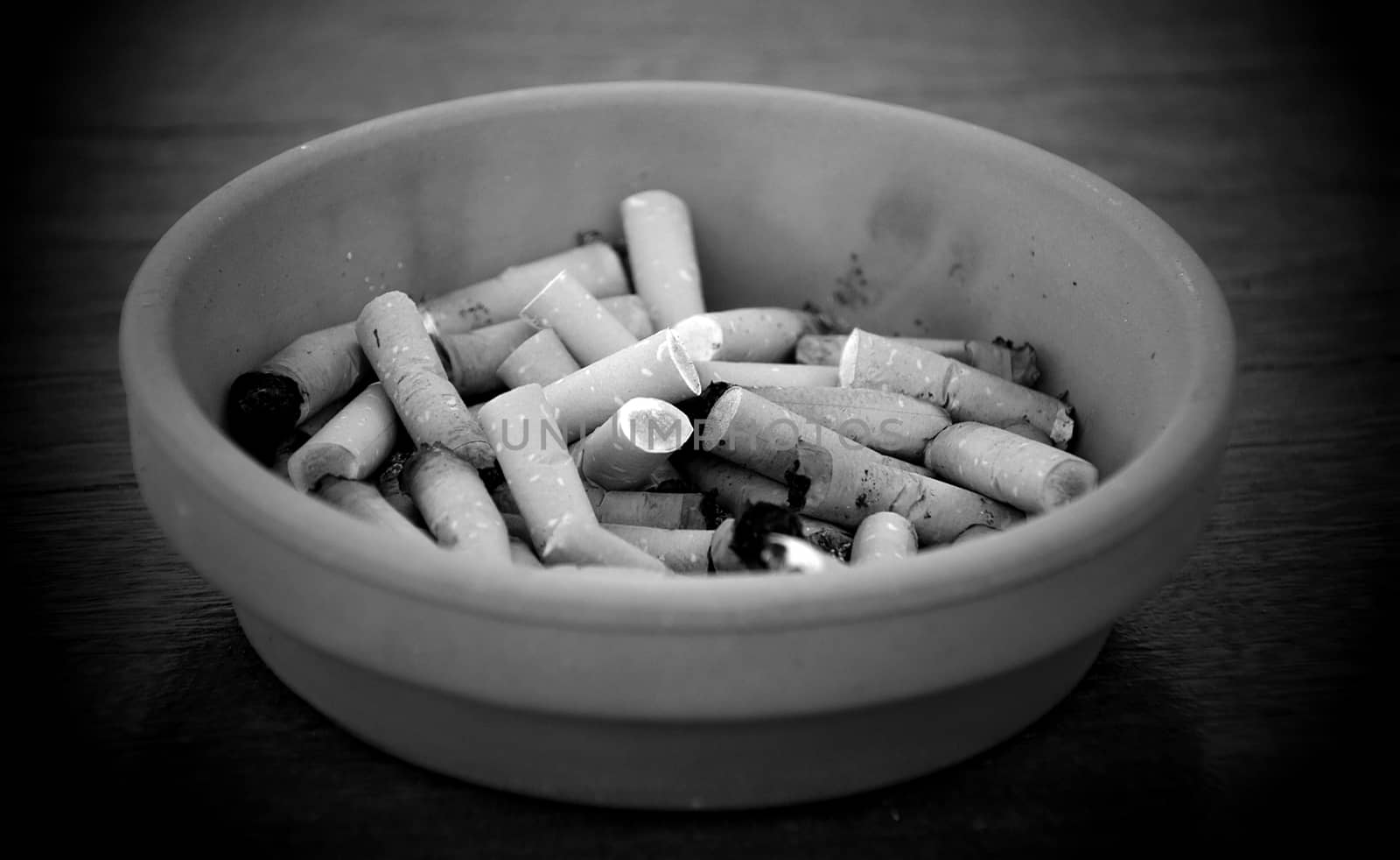 An ash tray full of cigarettes