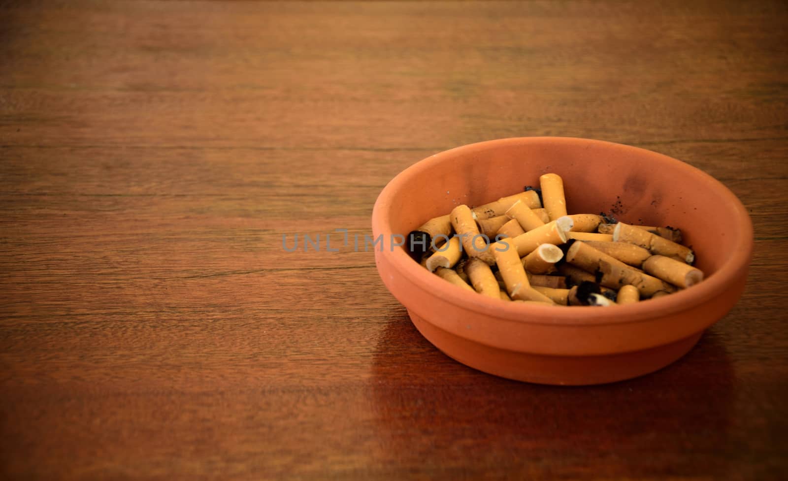 An ash tray full of cigarettes