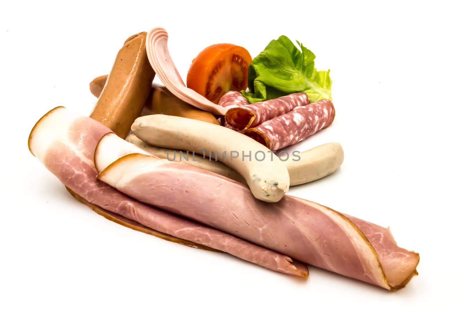 Different kinds of sausage and smoked bacon, on a white background