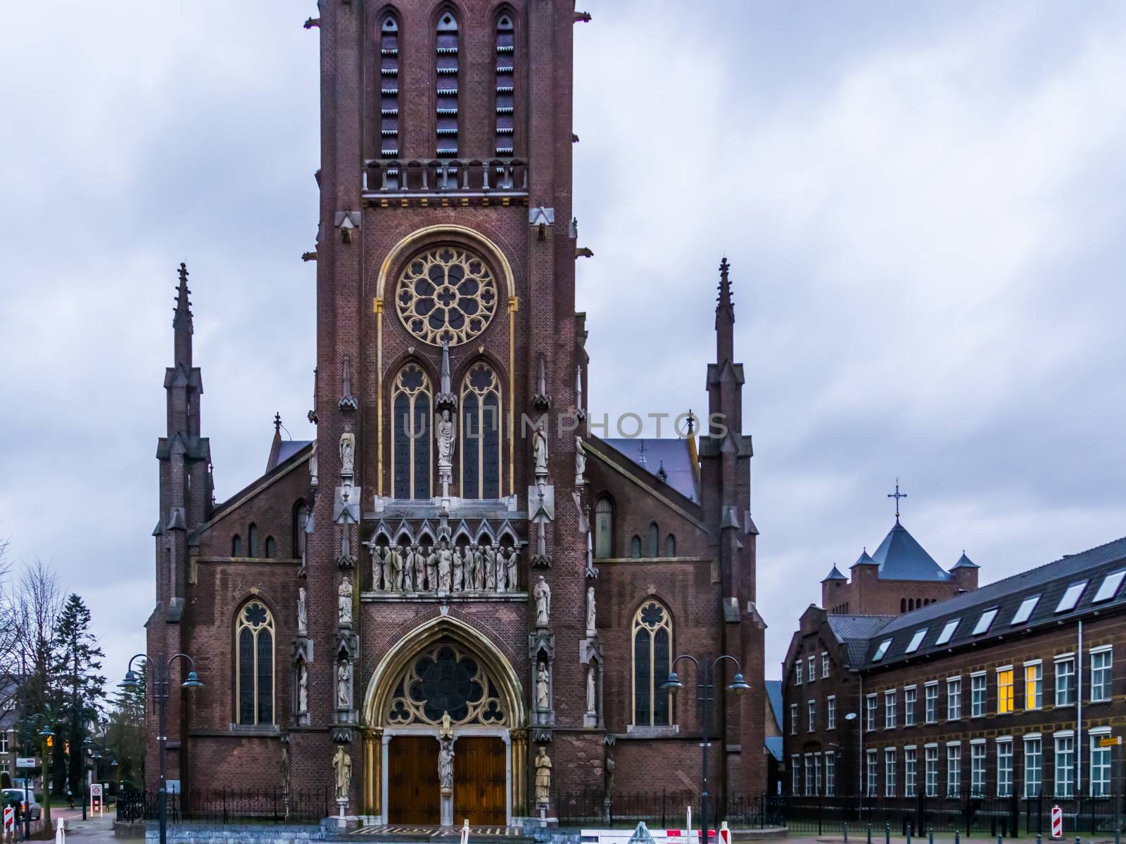 front view of the saint Lambertus church in Veghel city, The Netherlands, popular medieval architecture by pierre cuypers by charlottebleijenberg