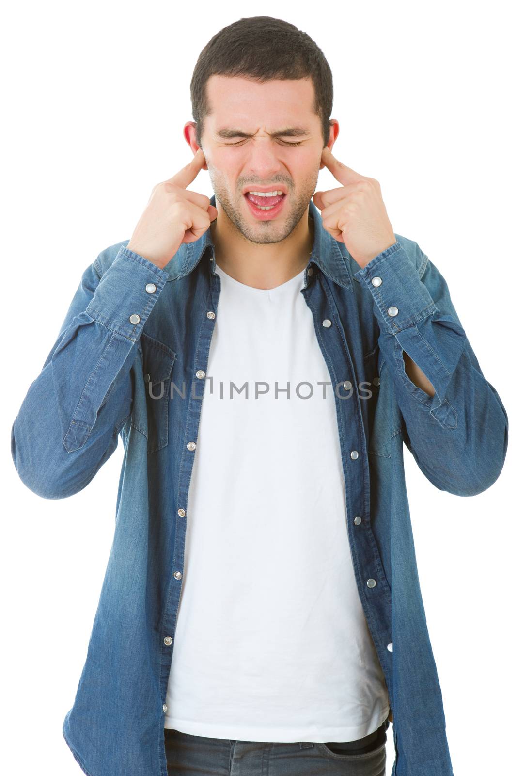 handsome young man covering his ears, isolated white background