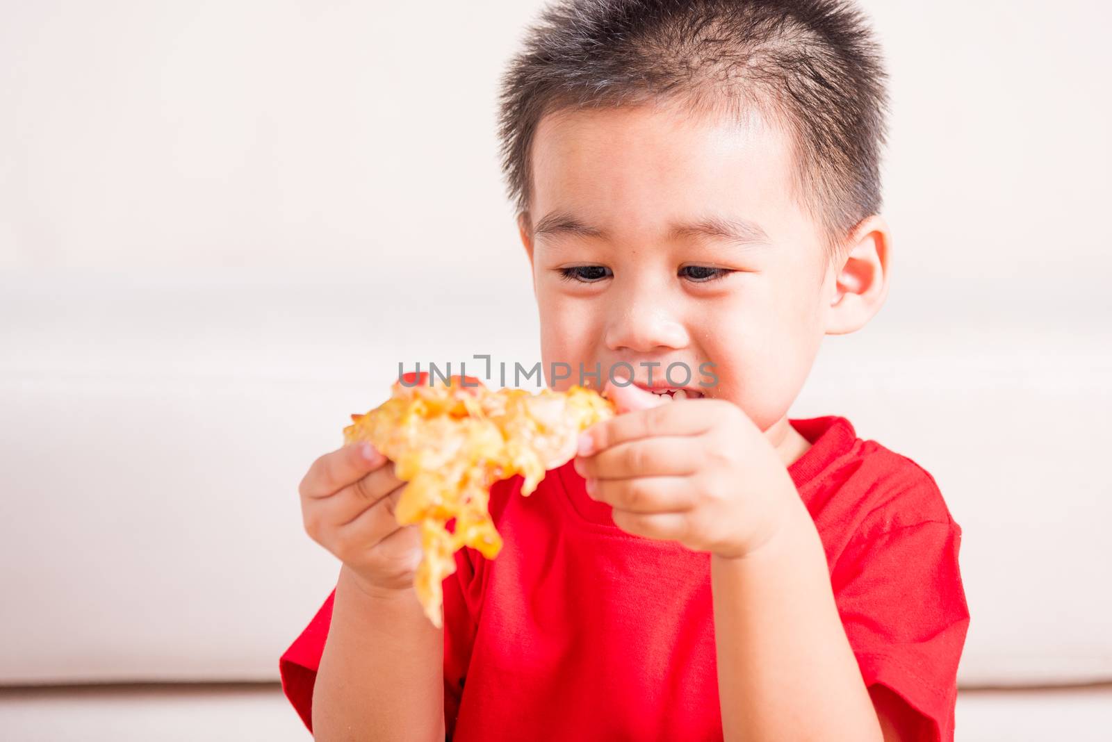 Little Child enjoying eating Delivery by Sorapop