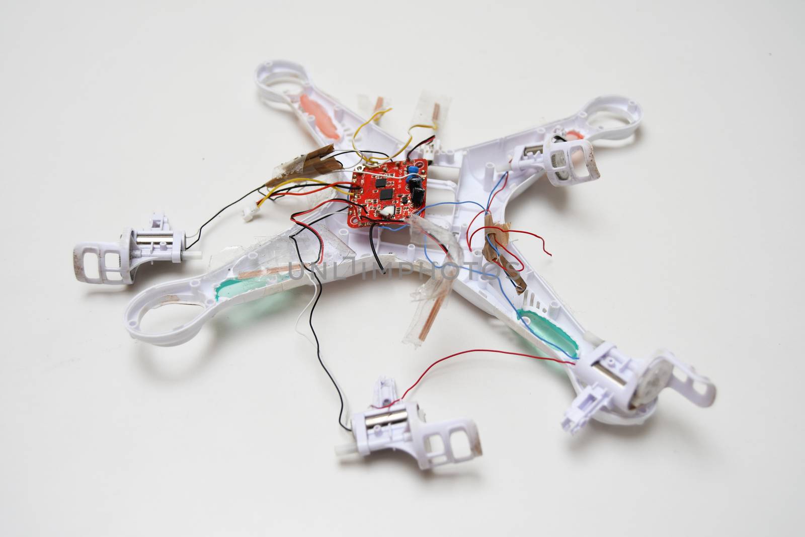White crashed broken drone