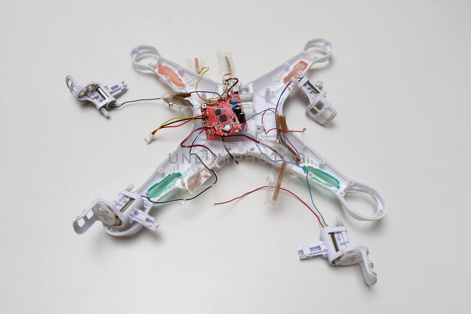 White crashed broken drone