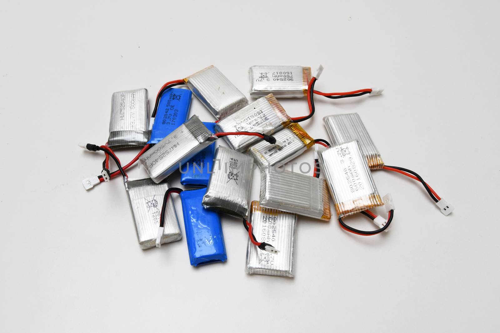 Bunch of small blue and grey drone li-po batteries