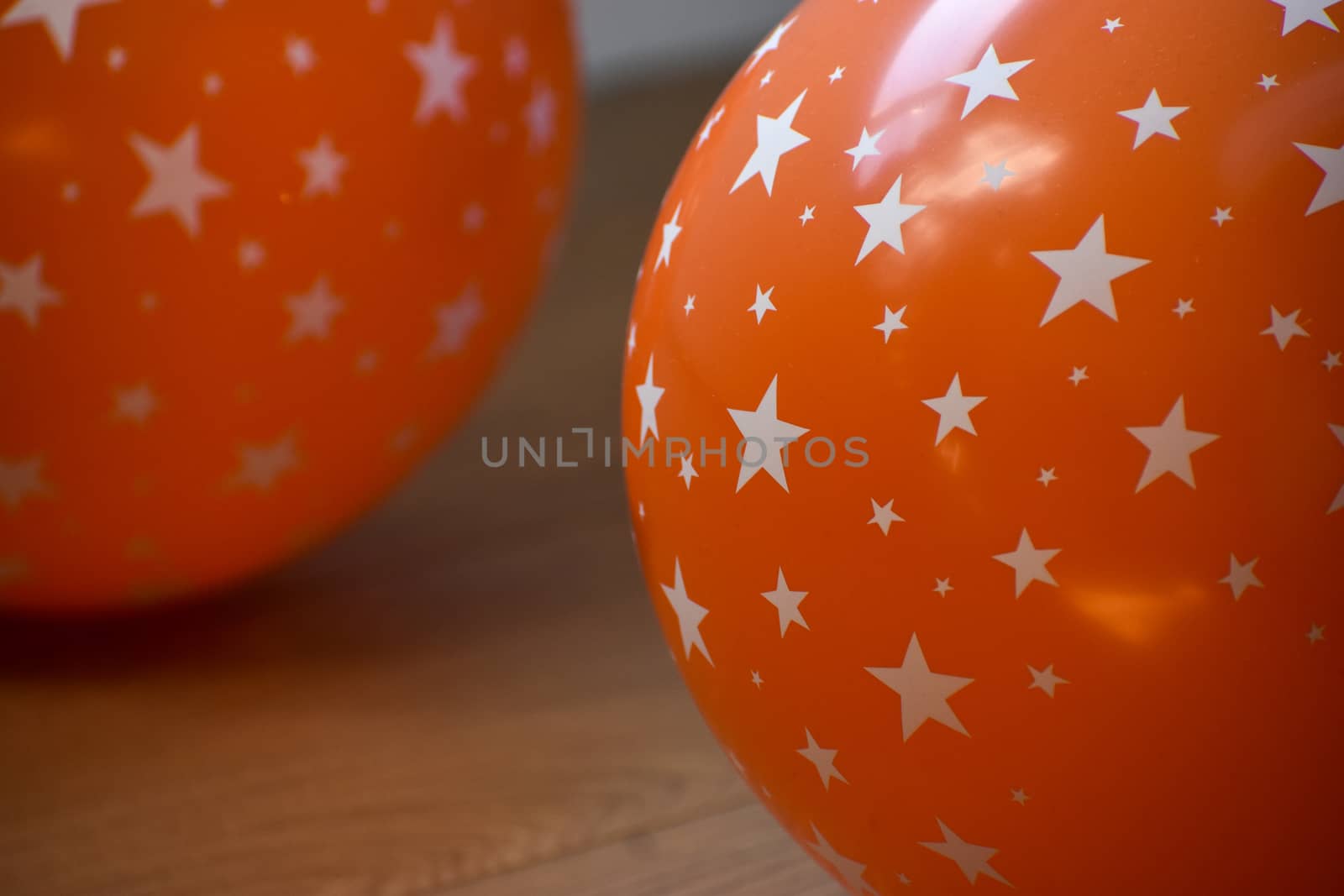 Vibrant Colorful celebration balloons on a wooden background
