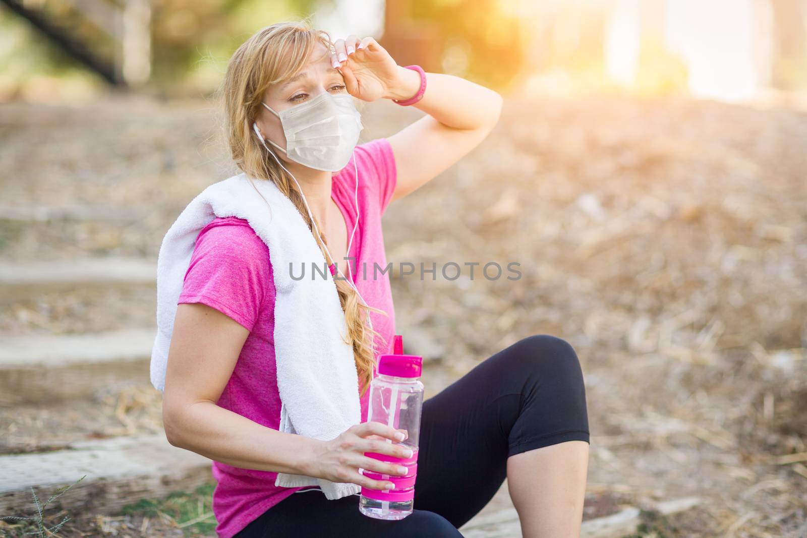 Girl Wearing Medical Face Mask During Workout Outdoors.