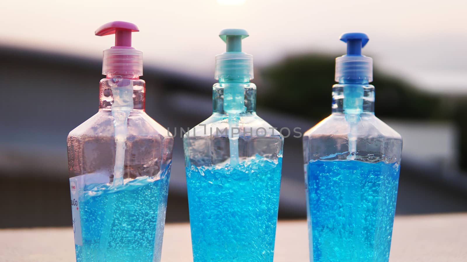 Dispenser bottles of alcohol based gel hand sanitizers to keep hands from germs and bacteria during the Covid-19 or Coronavirus pandemic.