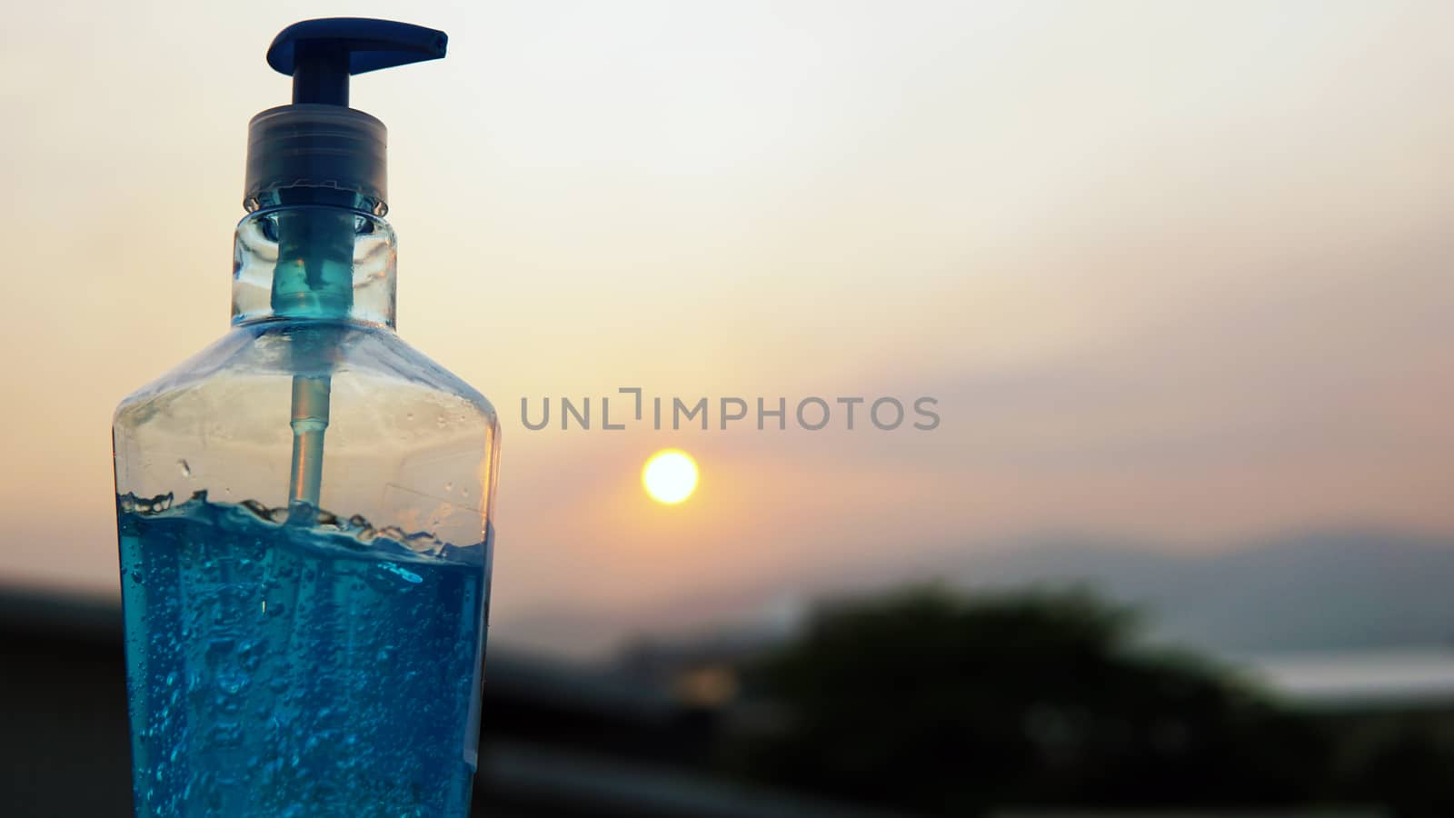 Dispenser bottles of alcohol based gel hand sanitizers to keep hands from germs and bacteria during the Covid-19 or Coronavirus pandemic.