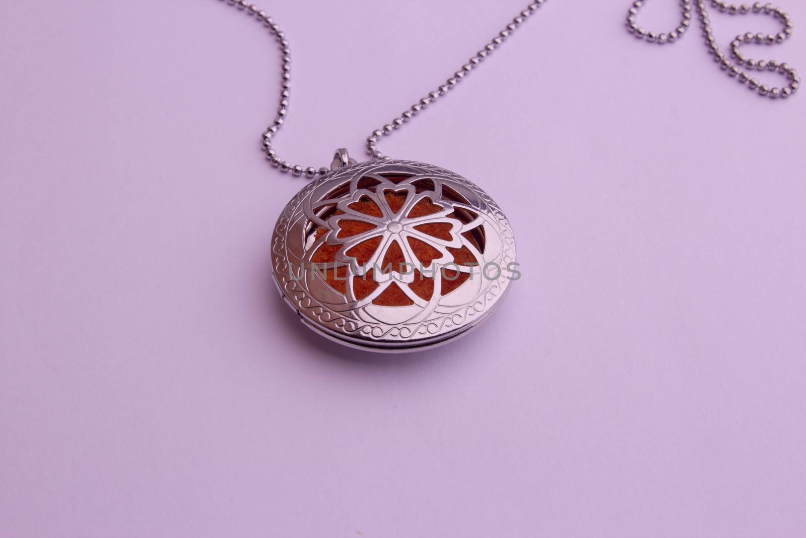 Essential oil infuser used as pendant of a necklace