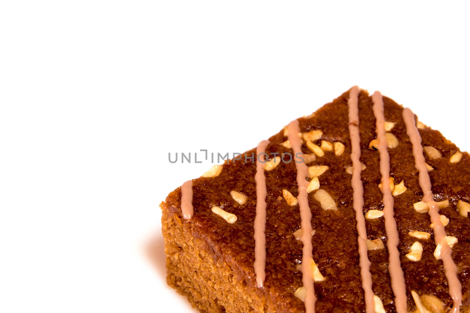 Small pieces caramel coffee cake isolated on white background by Satakorn