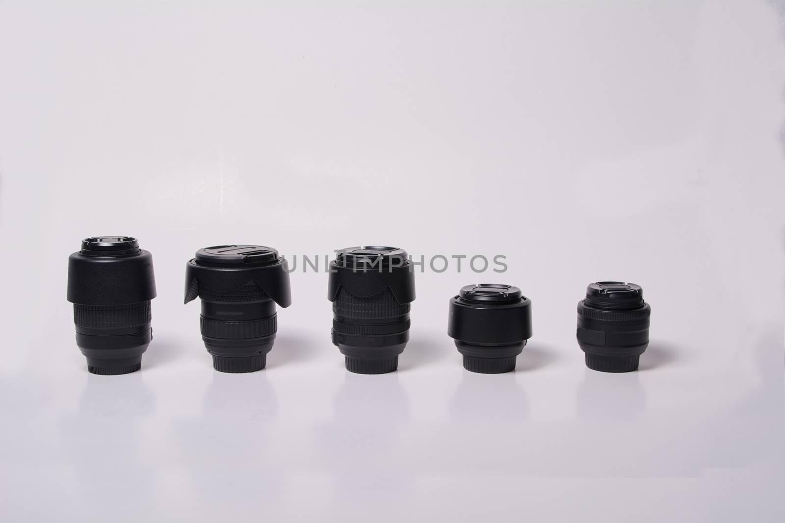 Photographic lens on white and clear background by raul_ruiz