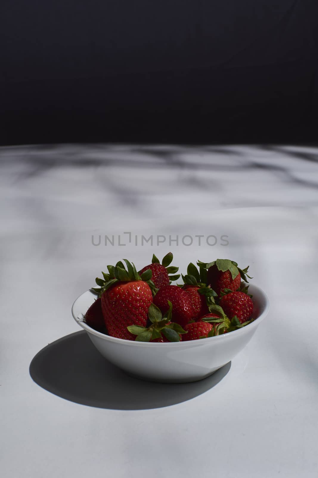 Bowl full of ripe strawberries ready to eat by raul_ruiz