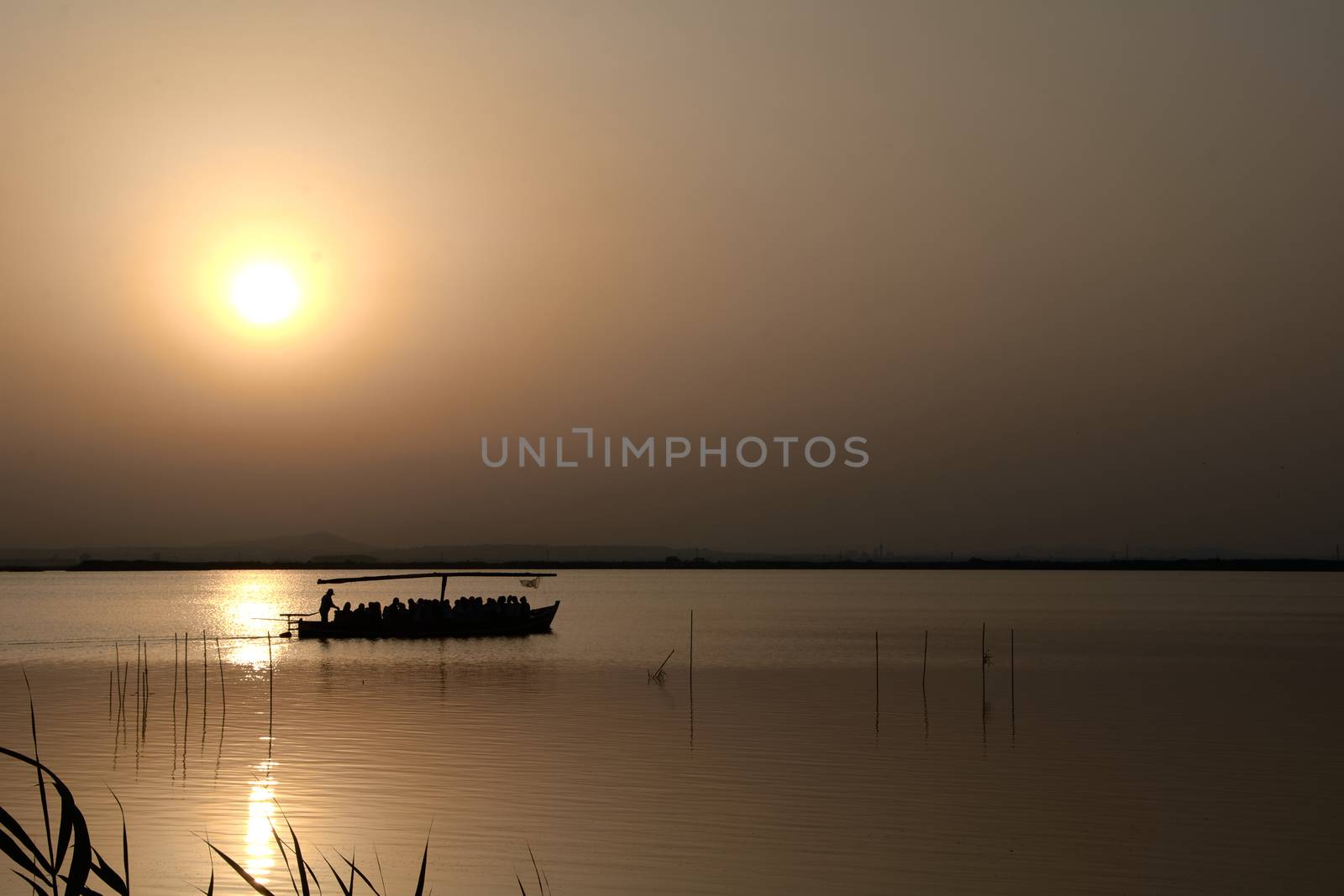 Reflections of the sunset in the lagoon by raul_ruiz