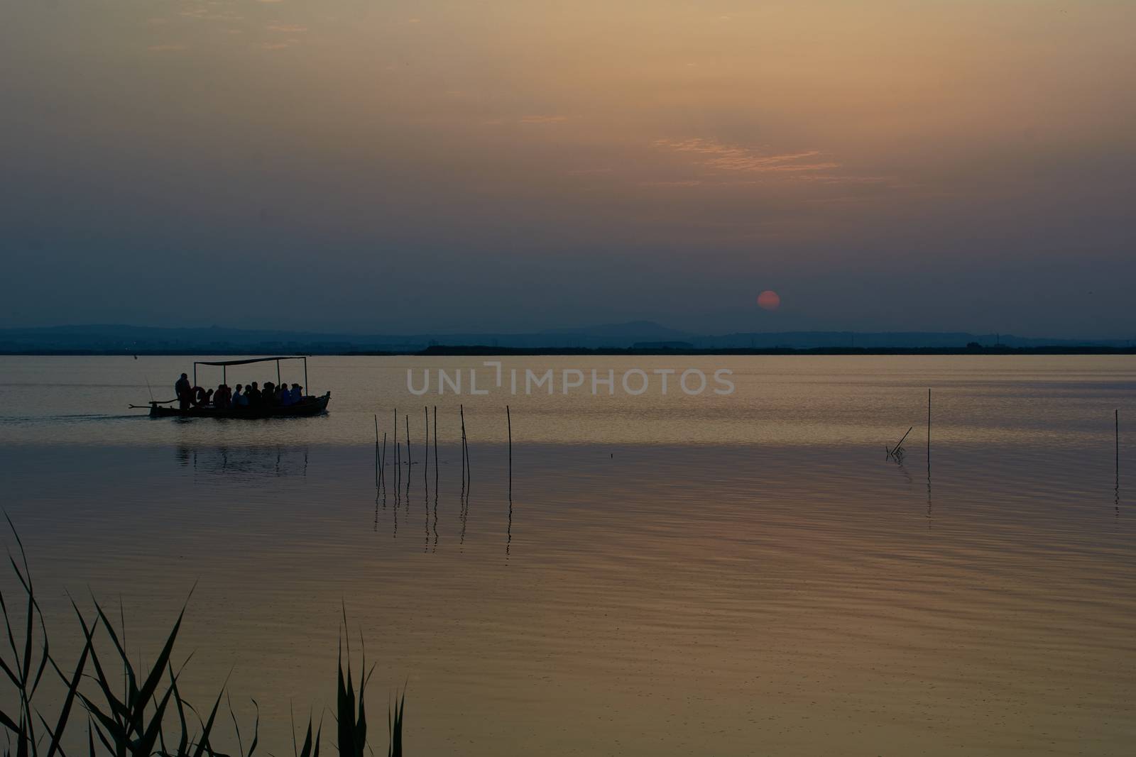 Reflections of the sunset in the lagoon.Sunset lights