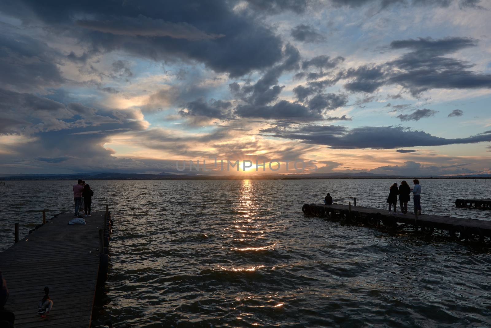 Spring sunset from the old wooden jetty. Sunset colors