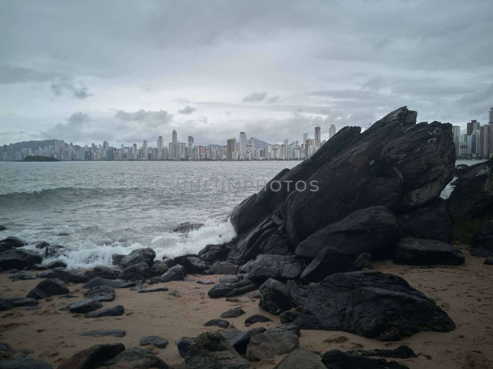 Rocks on the beach after the storm by raul_ruiz