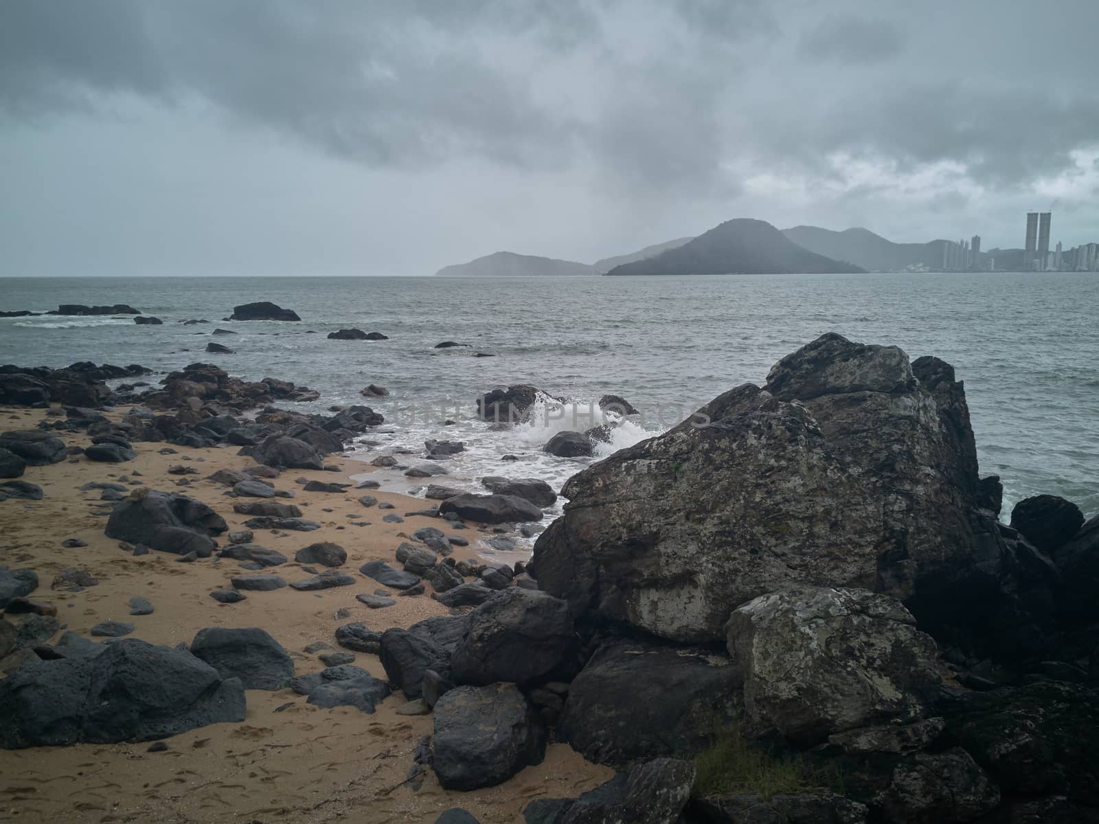 Rocks on the beach after the storm. Storm colors