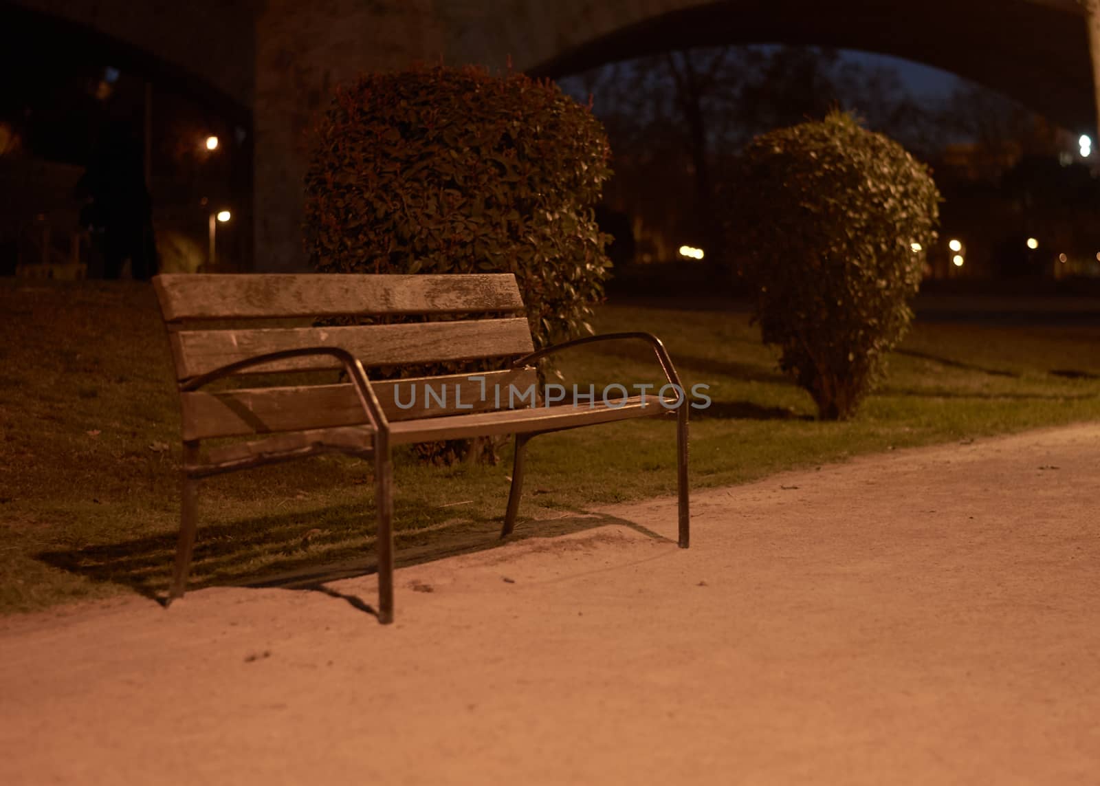 Lonely bench in the dark waiting for a friend.Loneliness and tranquility