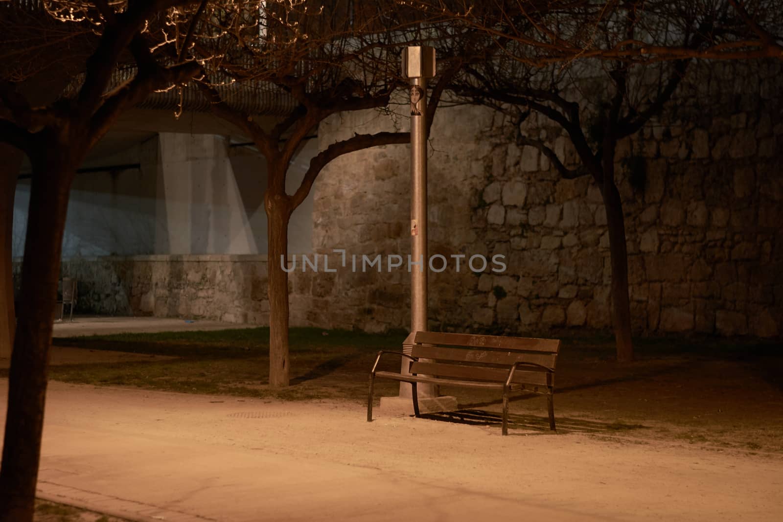 Lonely bench in the dark waiting for a friend. Loneliness and tranquility