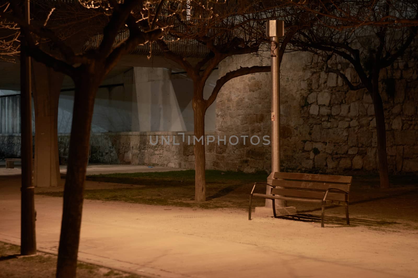 Lonely bench in the dark waiting for a friend. Loneliness and tranquility