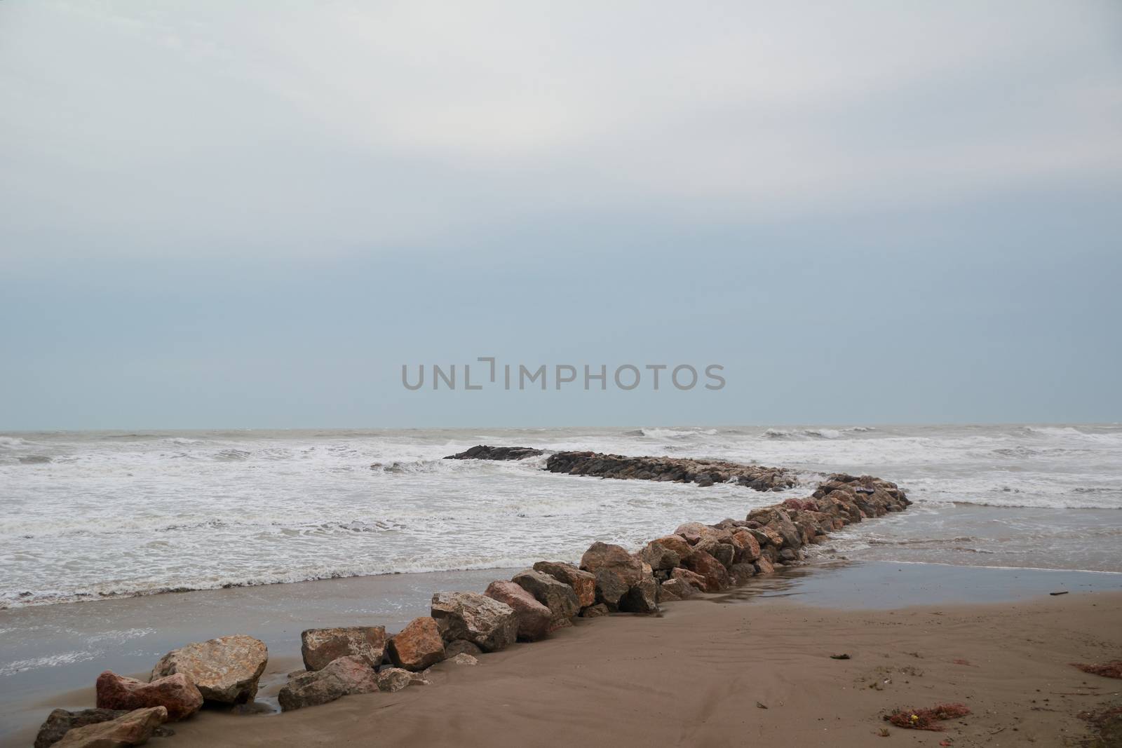 After the storm the calm on the beach. Storm colors