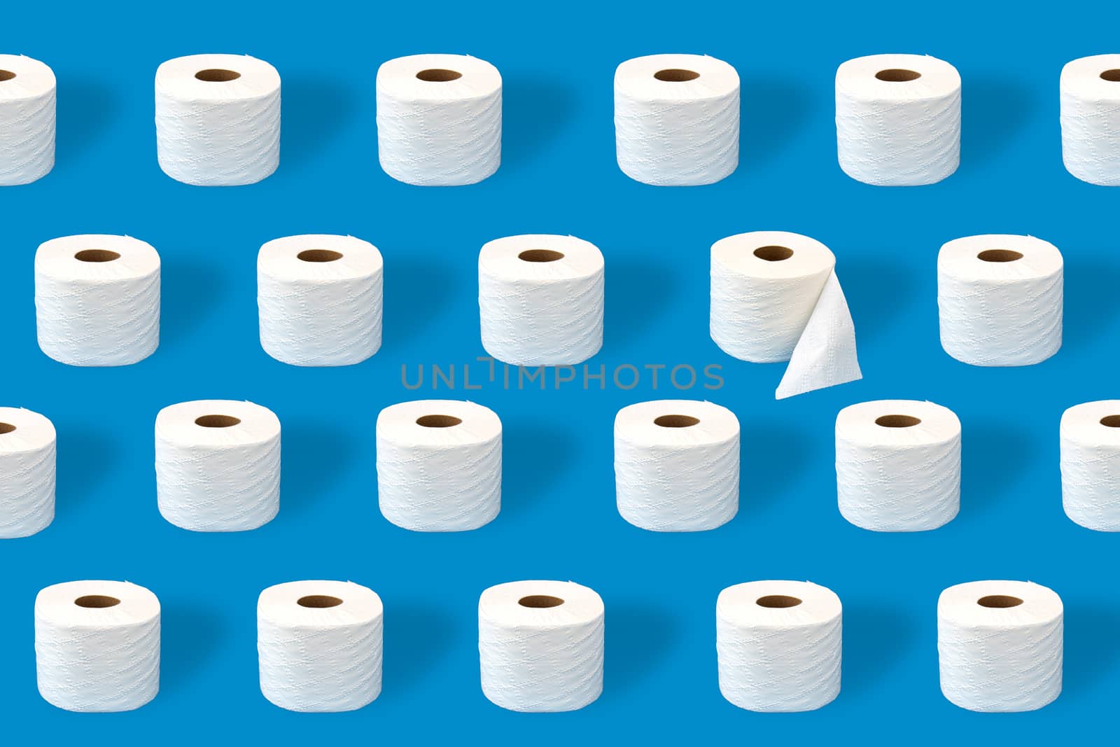 Toilet paper rolls on a blue background