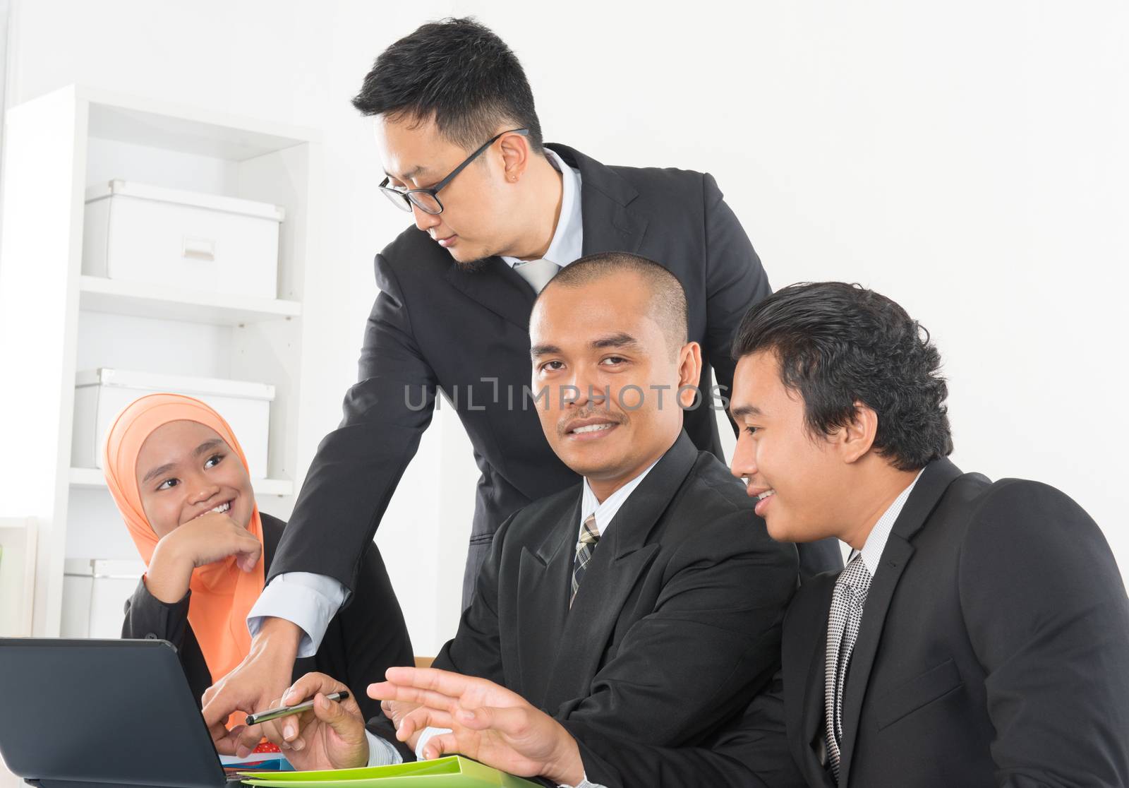 Malaysian business team  by szefei