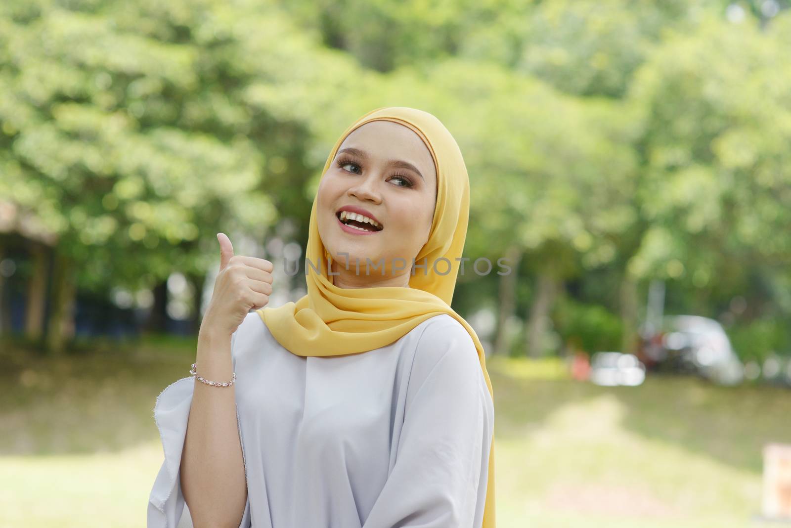 Muslim girl thumb up by szefei