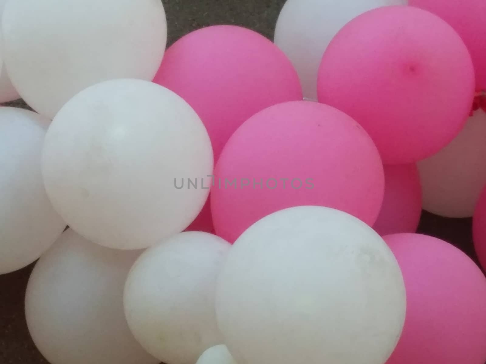 white and pink balloons