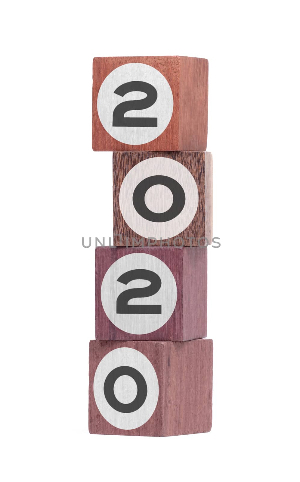 Four isolated hardwood toy blocks on white, saying 2020