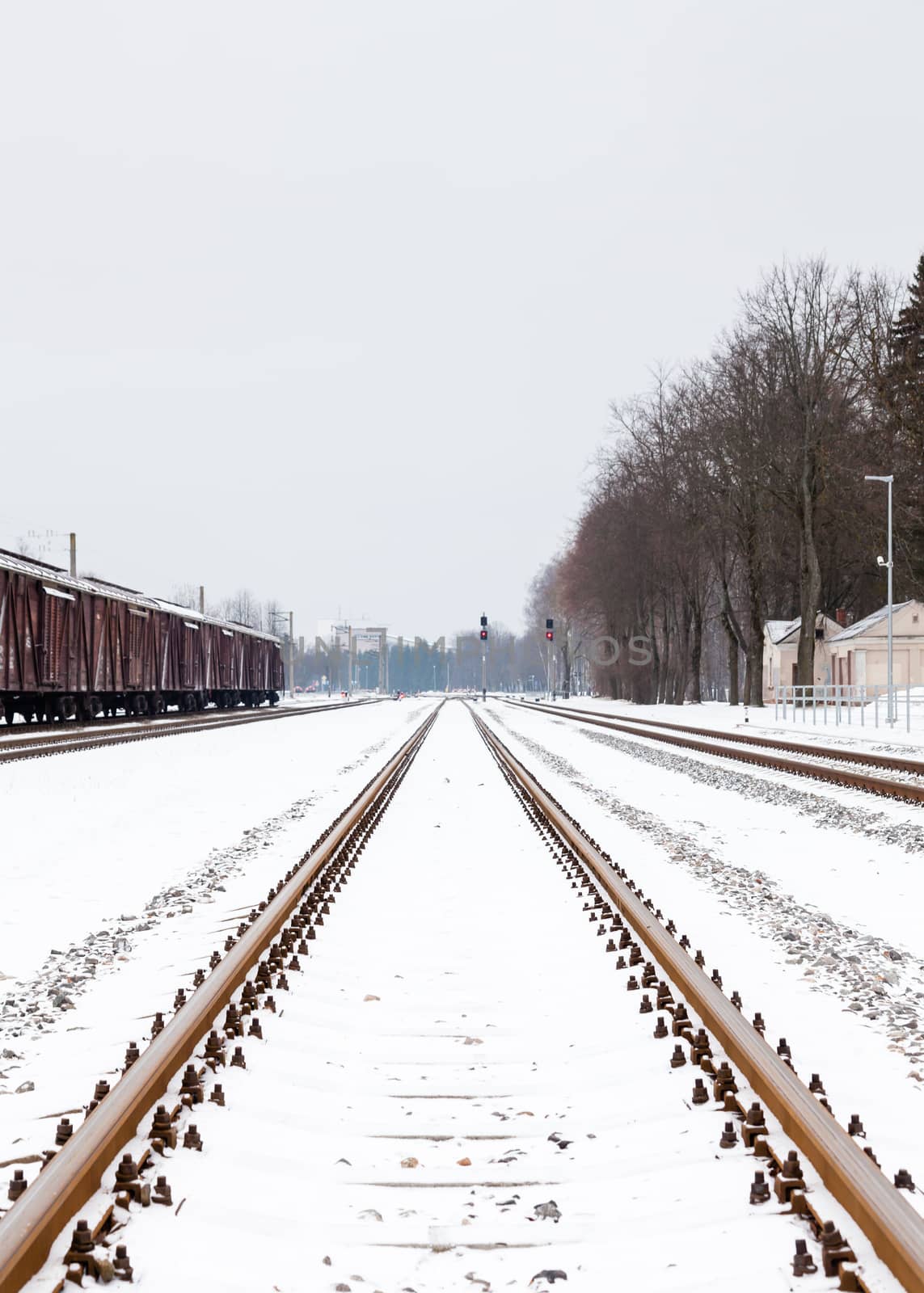The view along a snow covered railway track in Sigulda, Latvia.