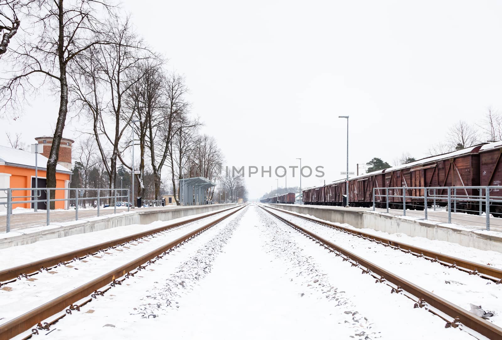 Snow Covered Railway Track by ATGImages