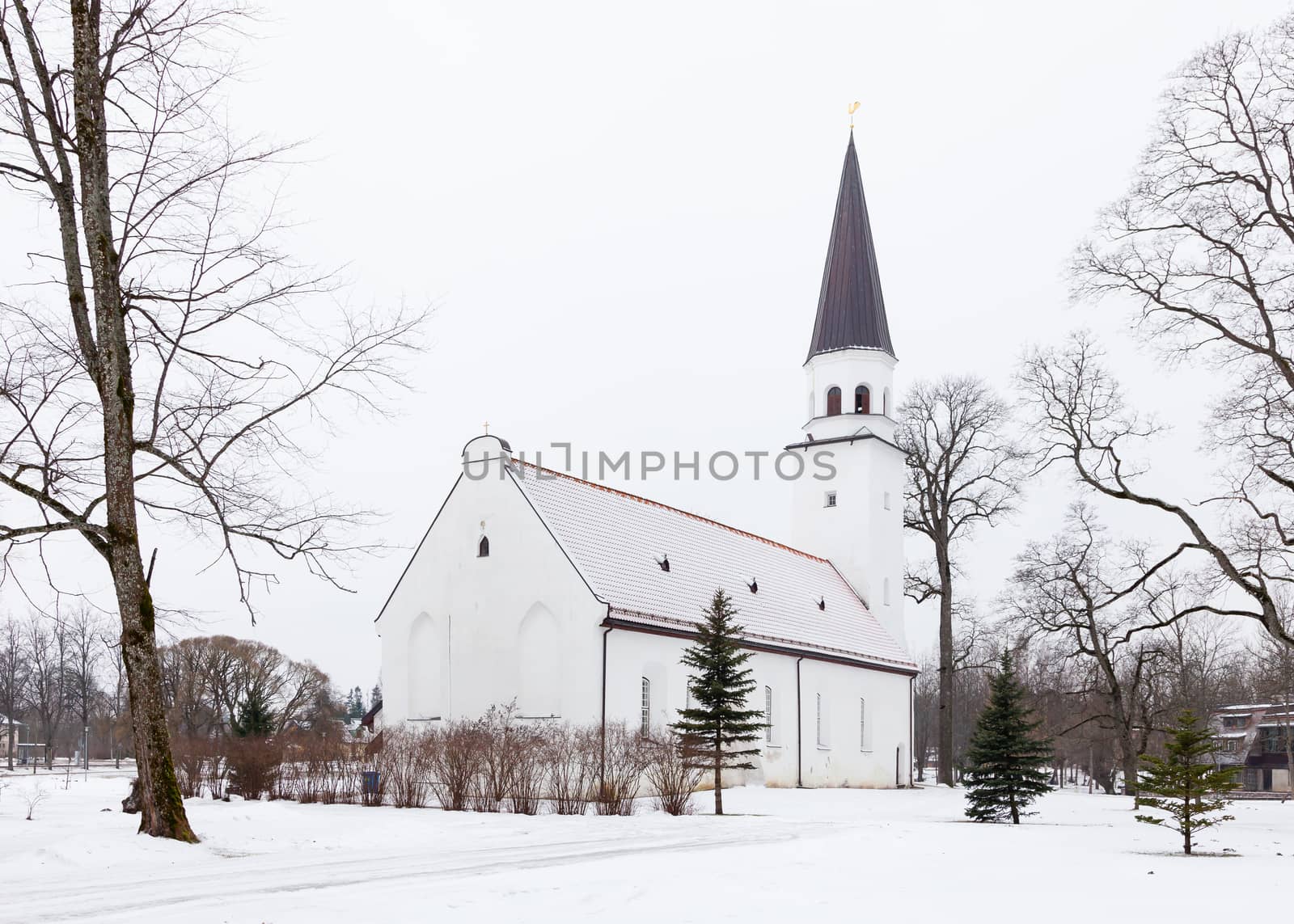 Sigulda is a town in Latvia and the church is pictured on a winter day.