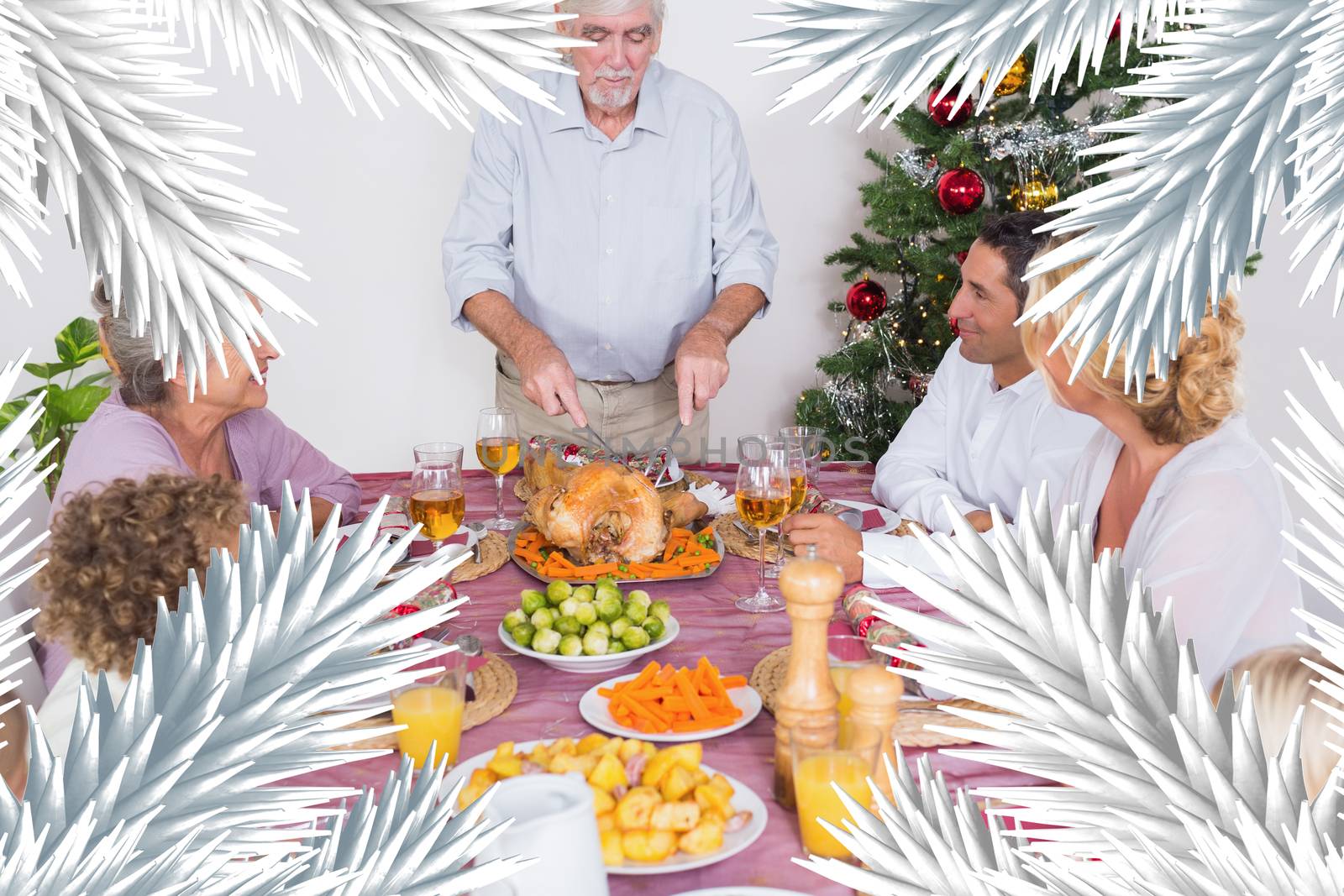 Composite image of grandfather carving the turkey against fir tree branches forming frame