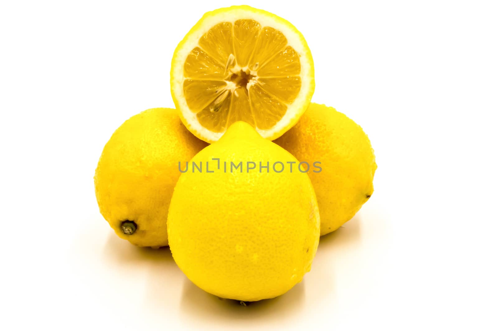 Composition with lemons isolated on white background.