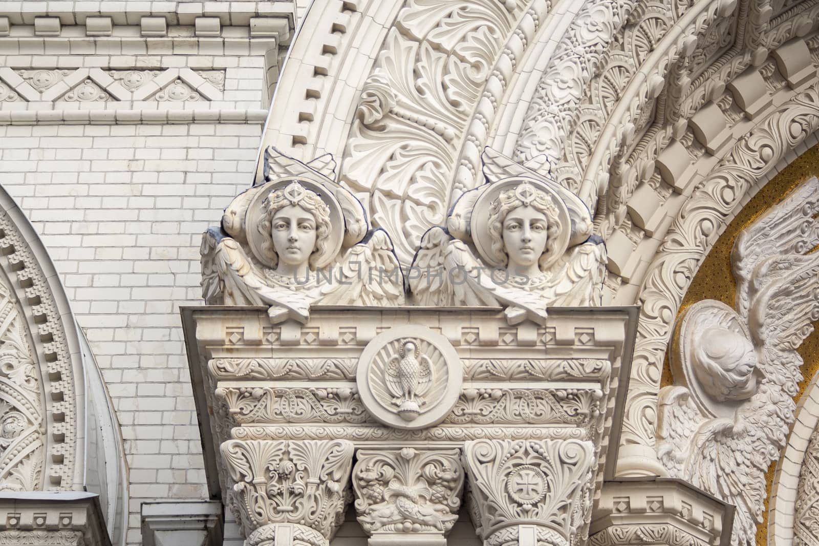 Two angels with wings on exterior of nicholas the wonderworker cathedral church. Architecture of unesco, orthodox sculptures