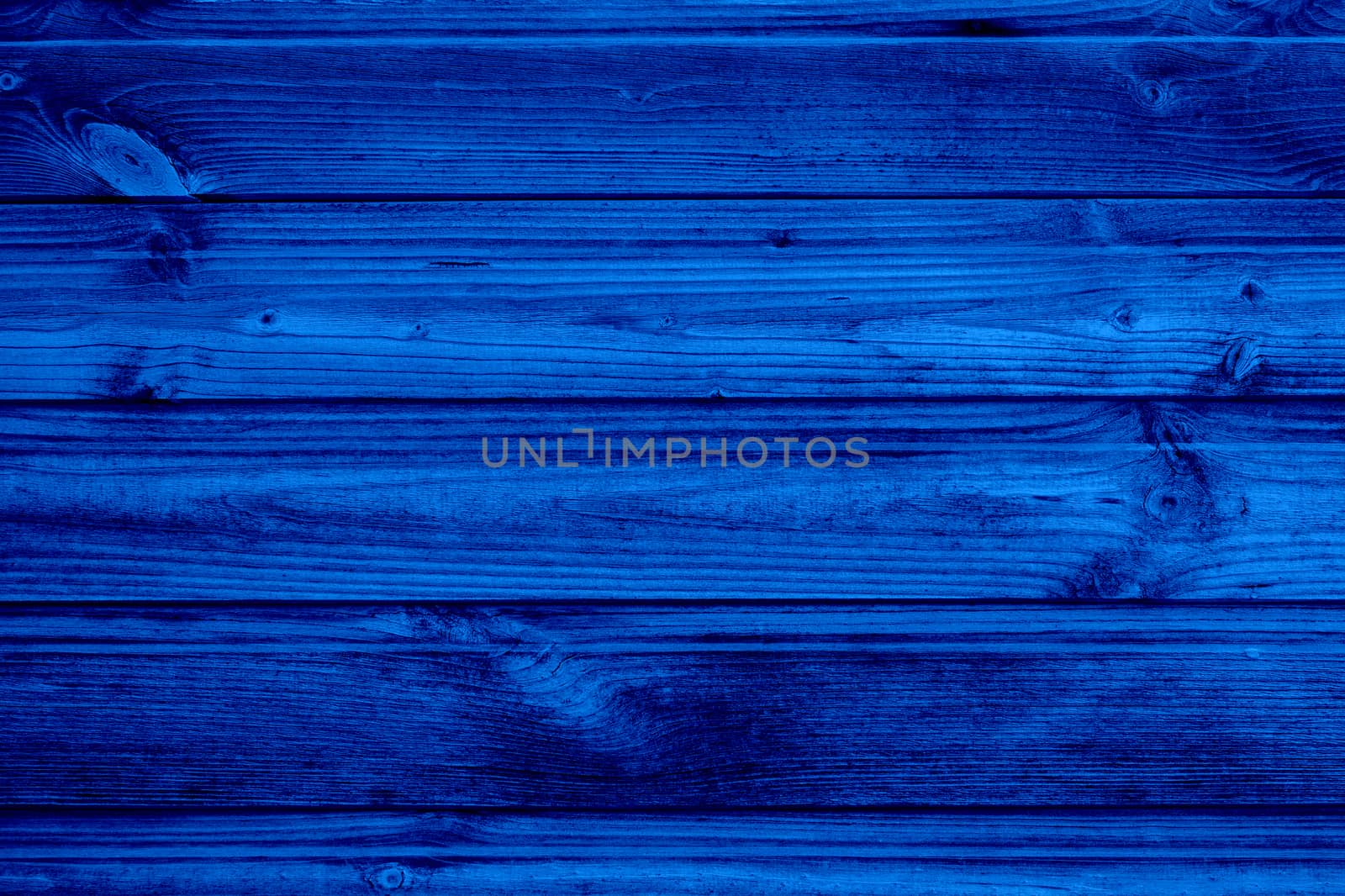 Rough wood texture with copyspace for design, wooden background, rough texture, in trendy blue 2020 color