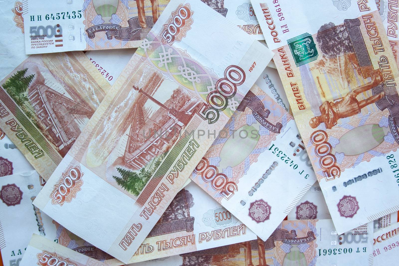 Rouble 5000 banknotes background top view. Texture of banknotes russian money