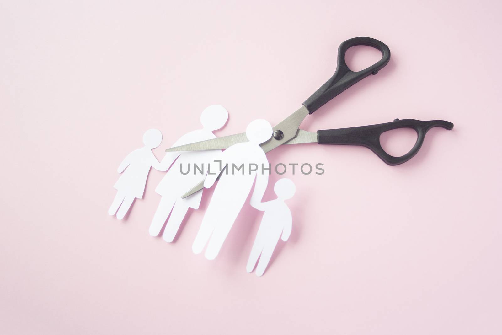 black scissor cutting family paper cut , dysfunctional family, bad children development, divorce parent broken family concept, mental health