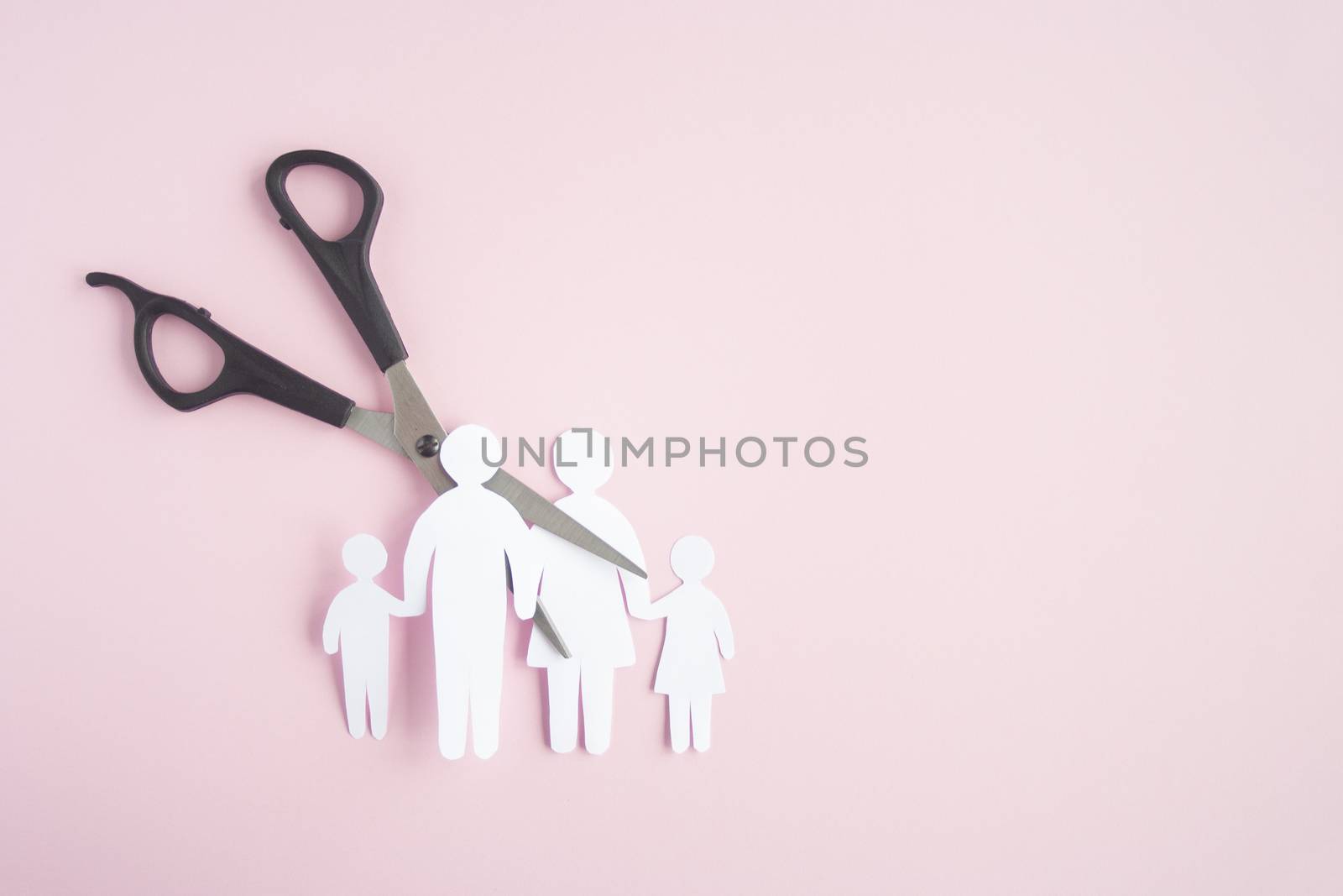 black scissor cutting family paper cut , dysfunctional family, bad children development, divorce parent broken family concept, mental health