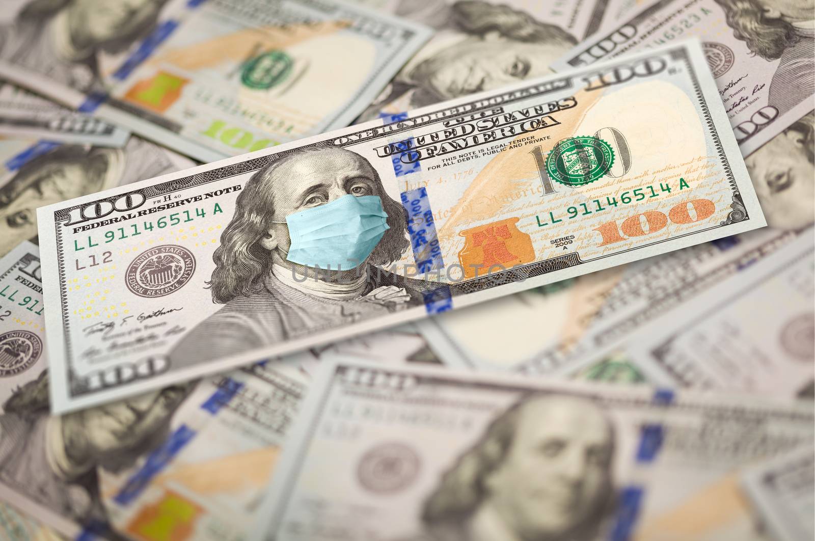 Pile of One Hundred Dollar Bills With Medical Face Mask on Face of Benjamin Franklin. by Feverpitched