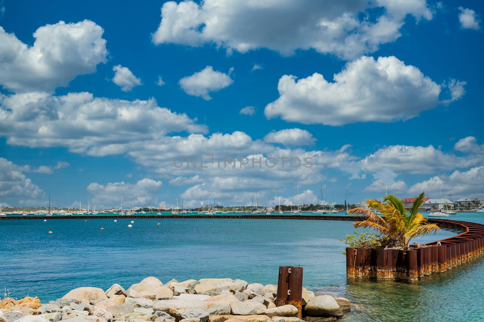 Curving Metal Seawall in St Martin Harbor by dbvirago