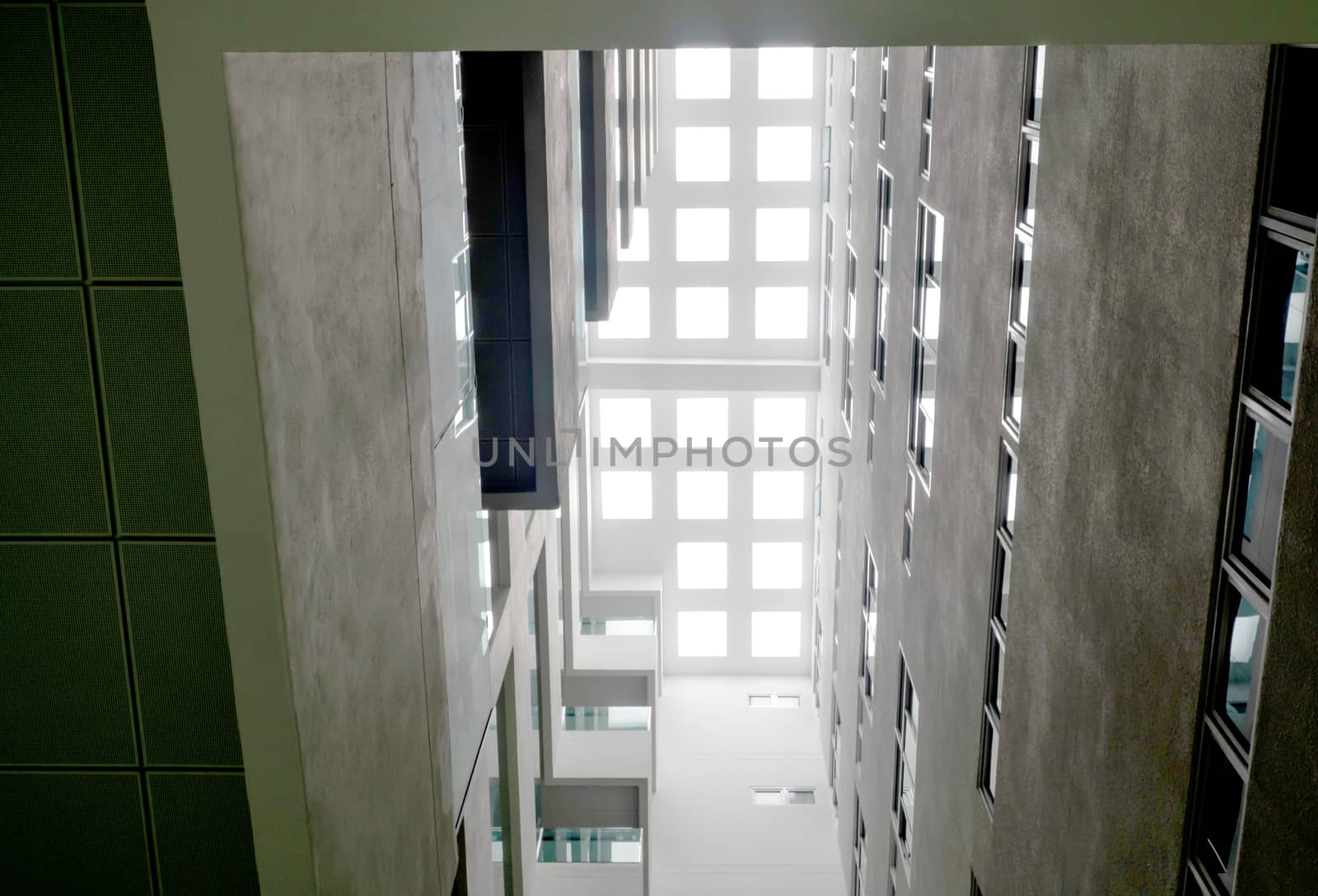 A Low vantage point in hall the high rise building, Looking up to the Daylight from the clerestory on the top of the building