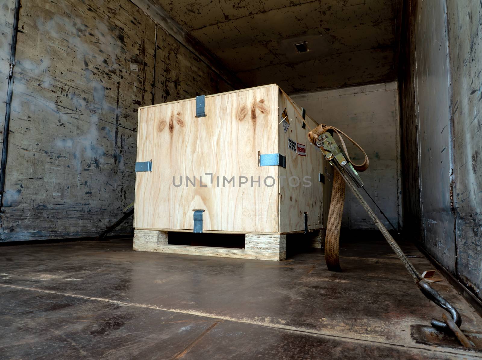 Radioactive material label beside the transportation wooden box Type A standard package in the truck