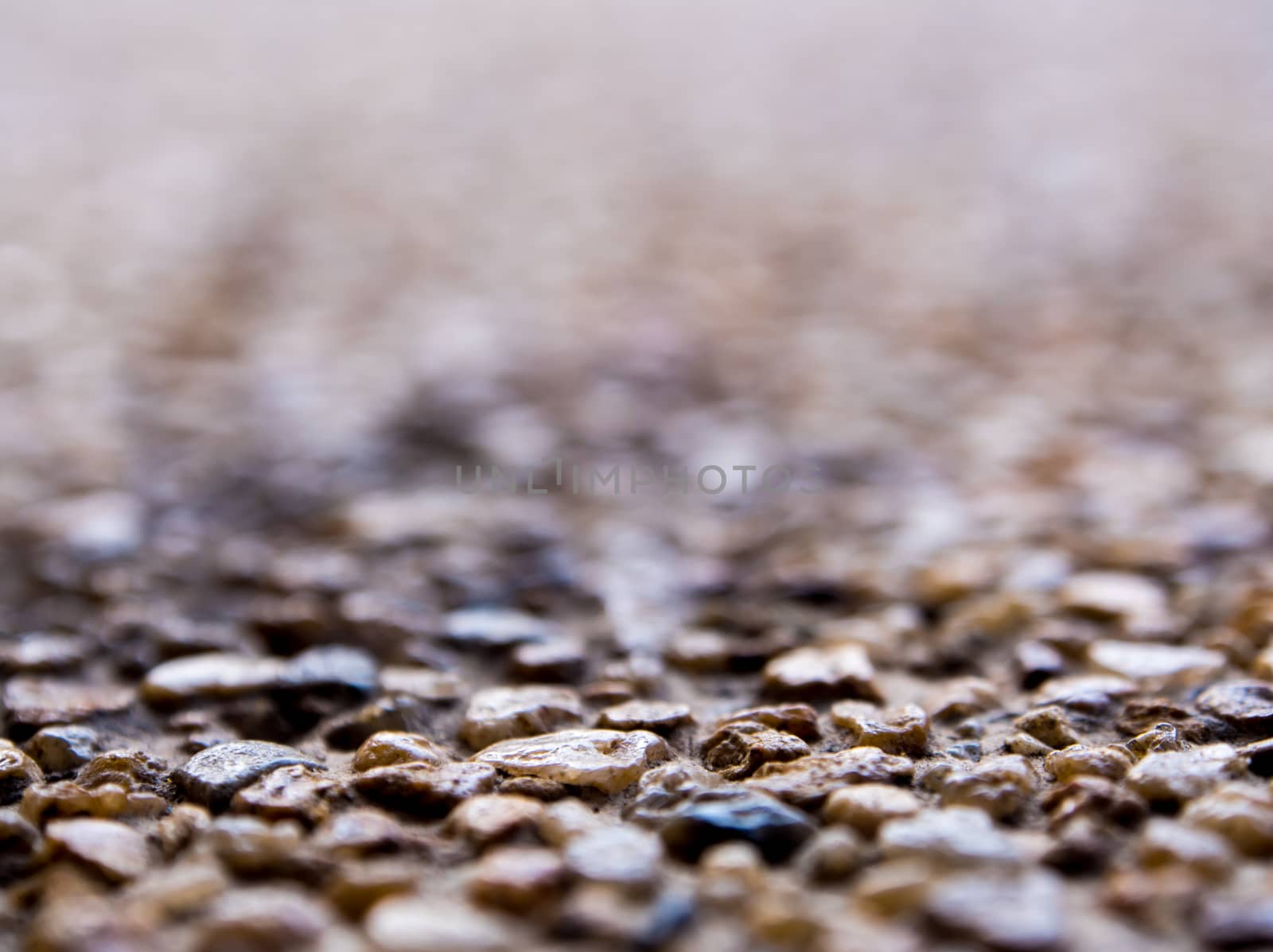 Texture of the exposed aggregate finish flooring by Satakorn