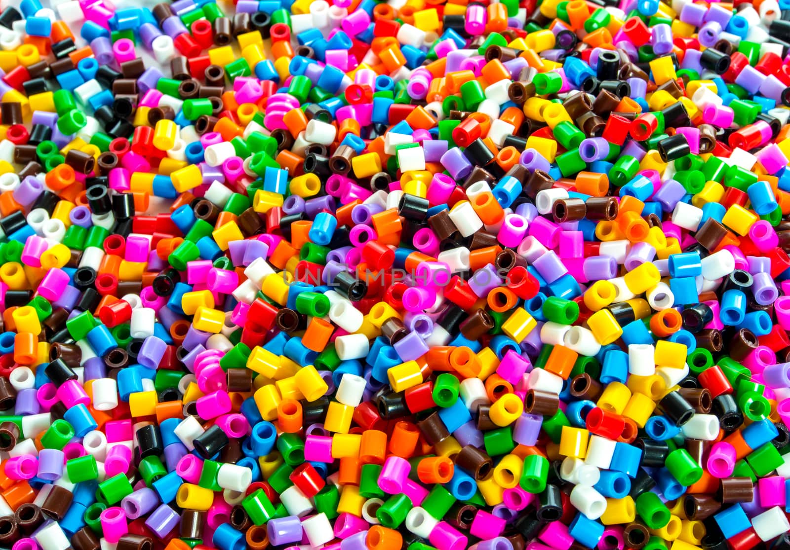 Texture of multicolor beads, colorful background by Satakorn